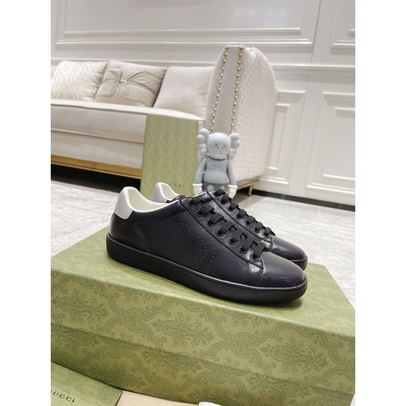 G*u*i sneakers